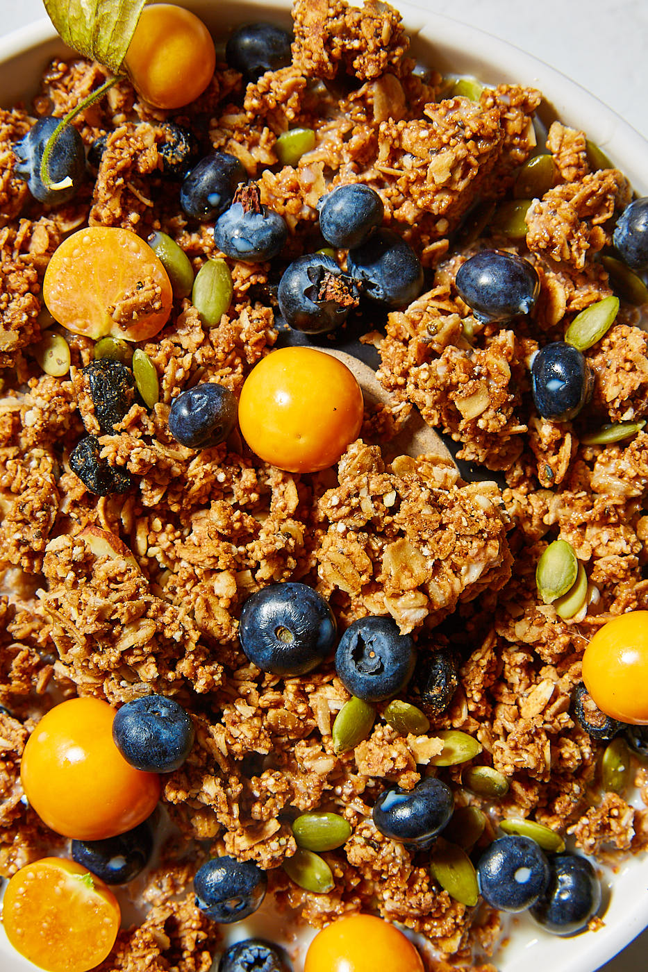 Granola and gooseberries with blueberries