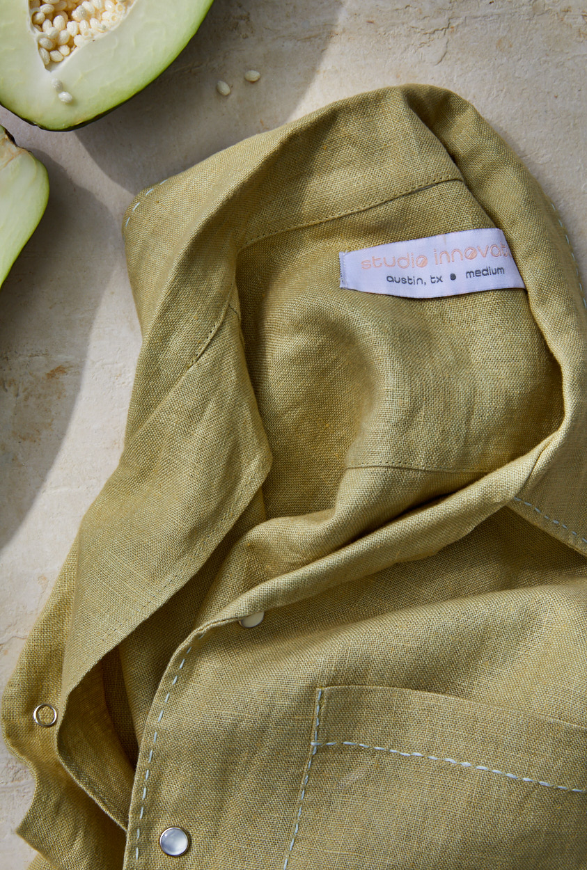 Green linen shirt detail