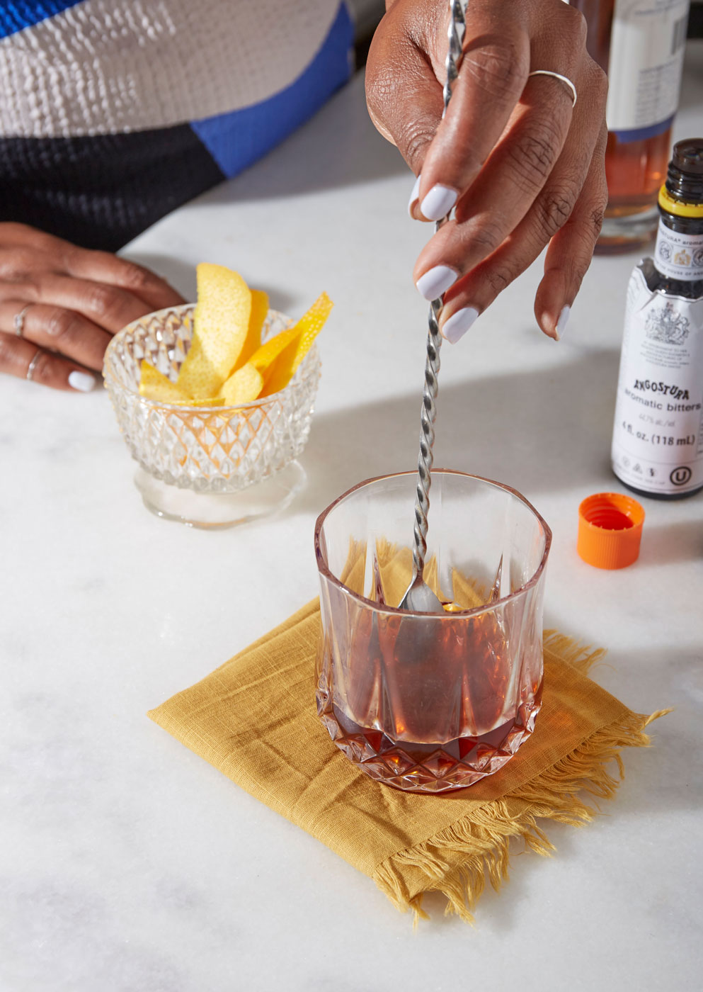 Drinking Coach stirring drink