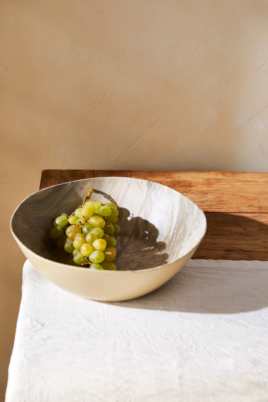 Melamine Bowl with grapes on wood table