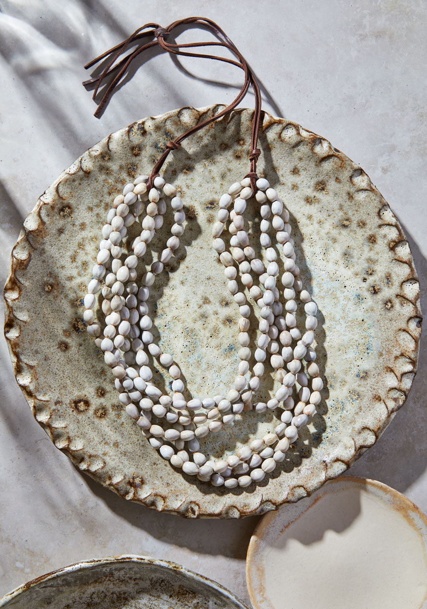 Natural-beads-on-brown-leather-cord