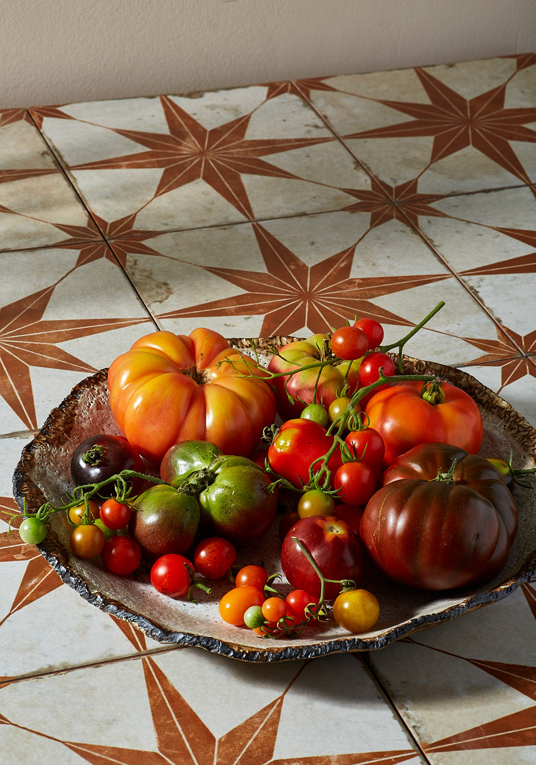 Summer tomato variety on vintage tiles