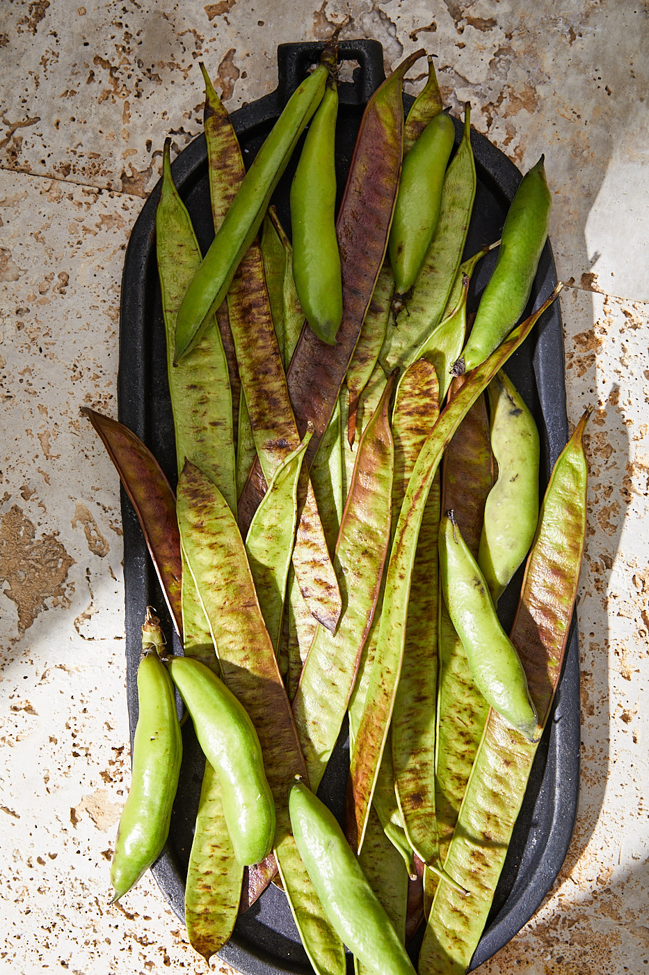 Longbeans on a black tray